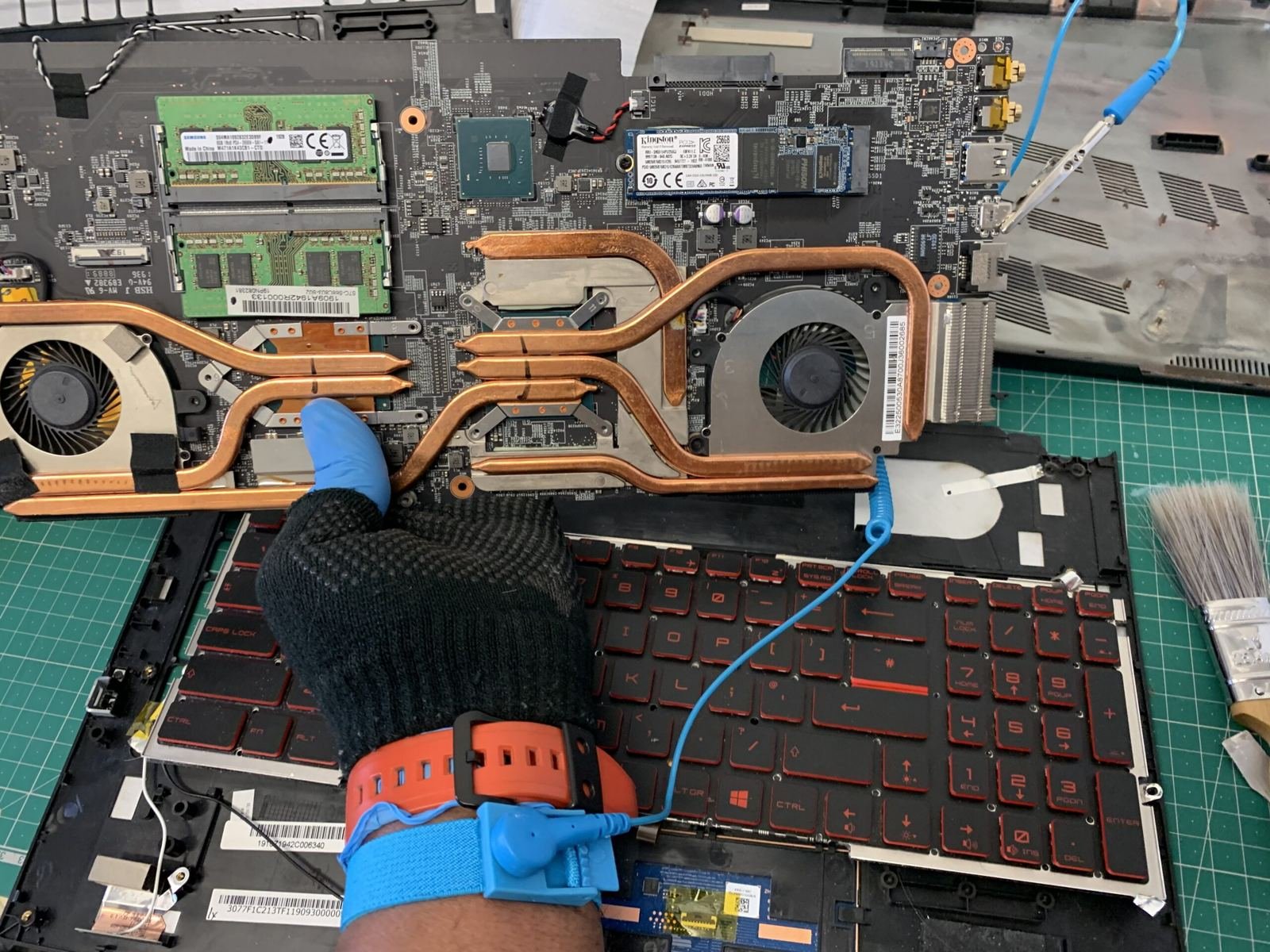 Technician repairing equipment